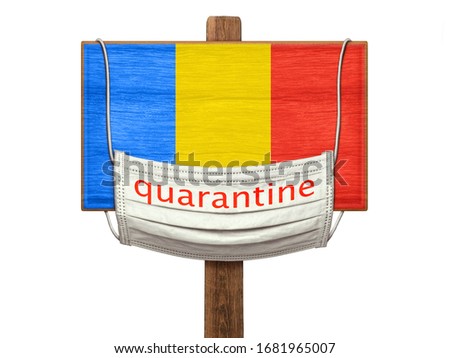Quarantine during the COVID-19 coronavirus pandemic in Romania. Medical mask with the inscription Quarantine hangs on a sign with an image of the flag of Romania. Anti-epidemic measures.