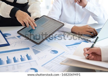 Businessmen are analyzing market data to clients or partners have been informed. business strategy concept. Royalty-Free Stock Photo #1682069491