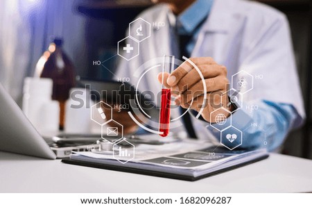 medical technology concept,smart doctor hand working with modern laptop computer with virtual icon diagram