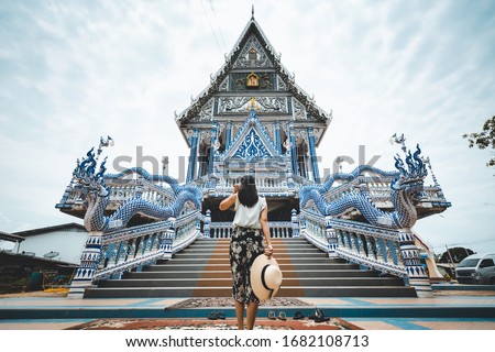 Asian traveller woman travel in Wat Pak Nam Khaem Nu temple, Chanthaburi, Thailand Royalty-Free Stock Photo #1682108713