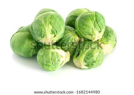 Fresh green brussel sprouts vegetable on white background Royalty-Free Stock Photo #1682144980