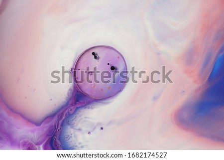 Abstract colors, backgrounds and textures. Food Coloring in milk. Food coloring in milk creating bright colorful abstract backgrounds. Colorful chemical experiment.