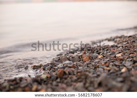 Sea pebbles on the seashore.