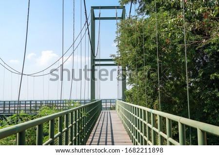 The suspension bridge  at Khao Bot temple or Wat Khao Bot, Rayong, Thailand