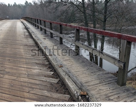 bridge, wooden plank floor, close-up view, blurred background