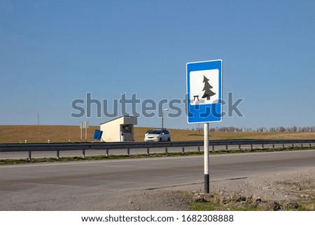 road sign on the background of the road