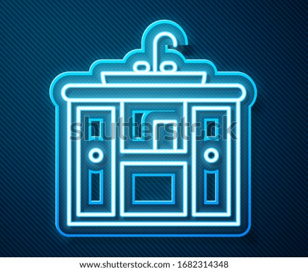 Glowing neon line Washbasin cabinet with water tap icon isolated on blue background.  Vector Illustration