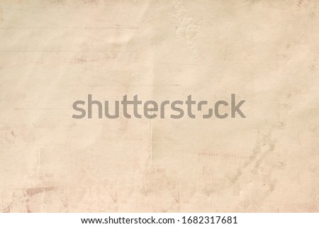 OLD BLANK GRUNGE NEWSPAPER TEXTURE BACKGROUND, WEATHERED CRUMPLED TEXTURED PATTERN Royalty-Free Stock Photo #1682317681