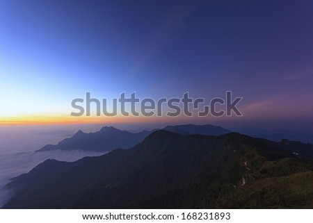 Landscape view on top of mountain and starscape
