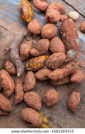 Red potatoes stack on wooden plates outdoors,Dominican republic