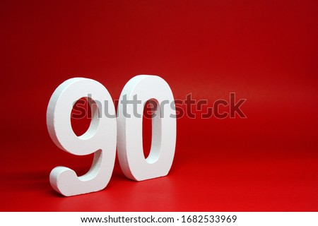 Ninety ( 90 ) white wooden number Isolated Red Background with Copy Space - New promotion 90% Percentage  Business finance Concept