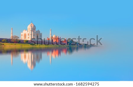 Taj Mahal mausoleum reflected in Yamuna river - Agra, Uttar Pradesh, India Royalty-Free Stock Photo #1682594275