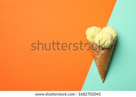 Ice cream on two tone background, space for text