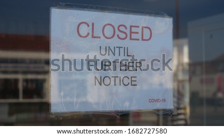 Independent shop closed until further notice due to the COVID 19 coronavirus pandemic, bars, cafes, restaurants, clubs all shut cause of this international crisis  Royalty-Free Stock Photo #1682727580