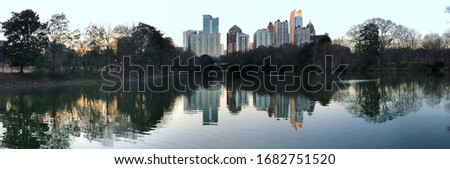 A Panorama of the Atlanta, Georgia skyline with reflections
