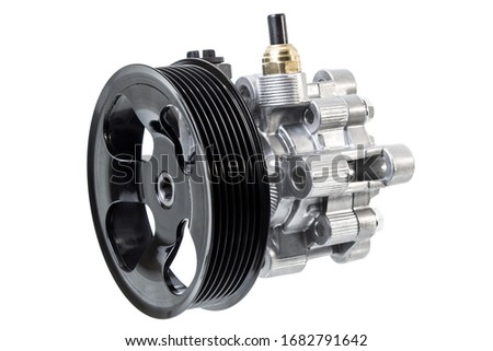 hydraulic power steering pump on a white background engine parts  Royalty-Free Stock Photo #1682791642
