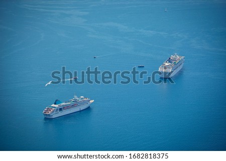 High Angle View Of Sailboat On Sea Against Blue Sky
