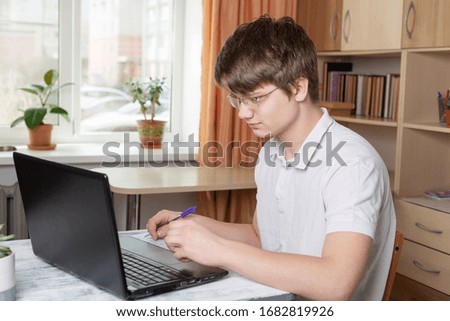 Student learning at home using laptop. Home school, online education, home education, quarantine concept - Image