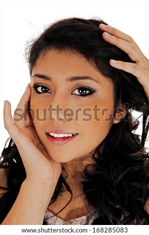 A closeup picture of a beautiful Hispanic woman with long black hair for white background. 