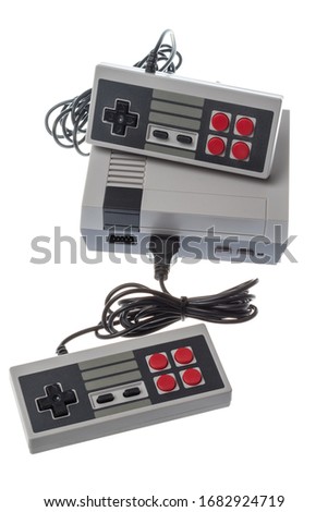 Retro 8bit gaming console with two joysticks isolated on white