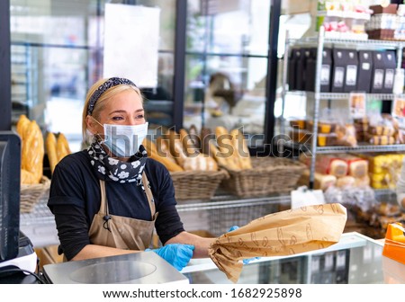 coronavirus, enterprising woman who uses protective measures to prevent the spread of the covid-19 virus Royalty-Free Stock Photo #1682925898