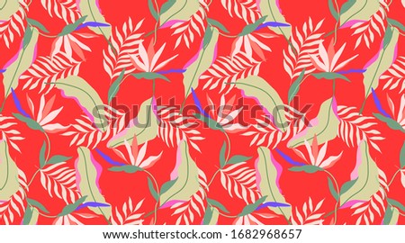 Red vibrant seamless exotic pattern. Tropical design for web and print. Strelitzia flowers, beige and soft green palm leaves on a red background. Modern hand drawn vector pattern design. 