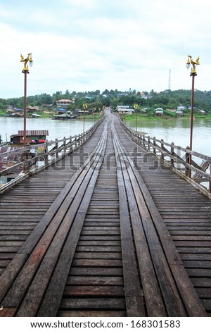 A long wooden bridge at Sangkha. Kan Buri province on Thailand. 