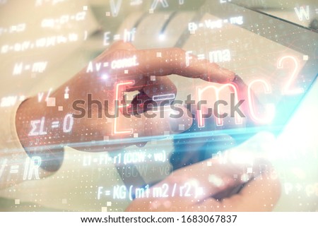 Double exposure of man's hands holding and using a phone and formulas drawing. Education concept.