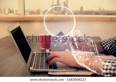 Double exposure of man hands holding a credit card and creative drawing. Start up and E-commerce pay on-line concept.