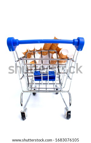 shopping cart lies a cigarette on a white background. isolate