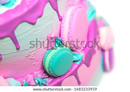 Elements of a birthday cake. Cake in the style of a multicolored unicorn with marshmallows and macaroni. On white background. Made of polymer clay. Props.
