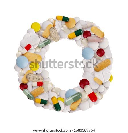 Capital letter O made of various colorful pills, capsules and tablets on isolated white background