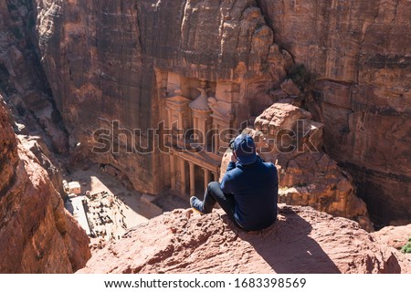 A man taking picture of the Treasury or Al Khazneh in Petra ruin and ancient city in Jordan , Arab, Asia