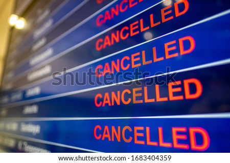 Cancelled flights at airport due to the Coronavirus  Royalty-Free Stock Photo #1683404359