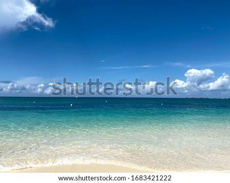 Landscape.Look at the horizon in the open sea from the shore.Beautiful natural background.Line horizon of the blue ocean and sky with clouds.Horizontal, free space, nobody.Concept of natural beauty.