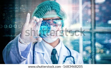 Doctor holding transparent tablet with futuristic hud screen tablet. Covid-19, Bacteria, virus, microbe. Medical concept of the future.  Royalty-Free Stock Photo #1683468205
