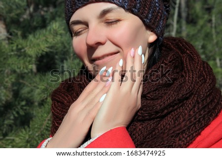 portrait of a woman on nature on a sunny day