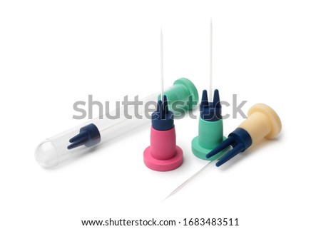 Micro pipettes for icsi on white background Royalty-Free Stock Photo #1683483511