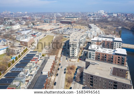 Aerial view of North Commerce Street in Milwaukee WI featuring the Milwaukee River and downtown skyline