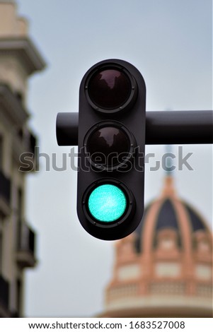 Red or yellow or green traffic light in the city isolated with the blurred background