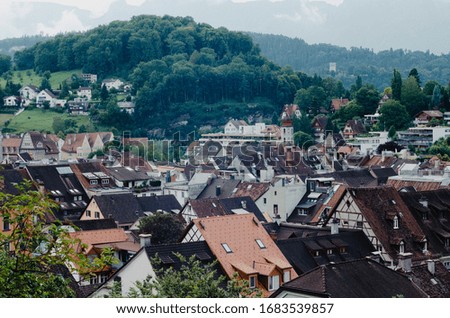 Top view of the old town roofs of houses with red roof