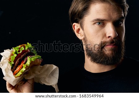 Bearded man t-shirt fast food meal diet and lifestyle