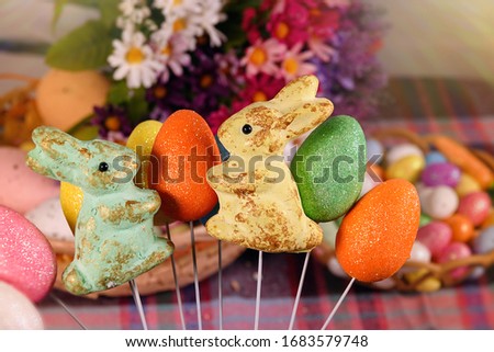 Rabbit Toy and Colorful Paschal Easter Eggs 