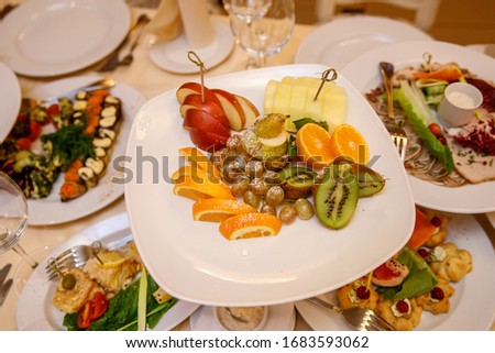 Fruit and other snacks on the banquet table
