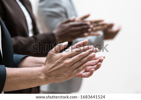 Hands of business colleagues applauding speaker. Business group appreciating presentation, seminar, training or conference. Applause or success concept Royalty-Free Stock Photo #1683641524