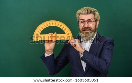 Teaching about angles. Mathematics for better future. Personal lesson. Mathematics and people concept. Mathematics favorite subject. Man teacher use math rule tool. Bearded tutor at chalkboard.