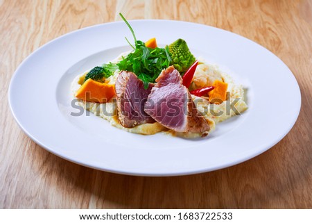 Beautiful and tasty food on a plate Royalty-Free Stock Photo #1683722533