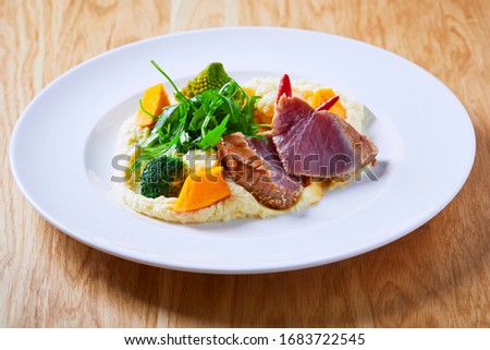 Beautiful and tasty food on a plate Royalty-Free Stock Photo #1683722545