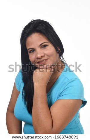 portait of woman with hand on head on white