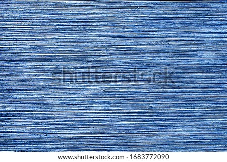 Blue metal texture with scratches. Abstract noise background overlay for design. Art stylized baner.